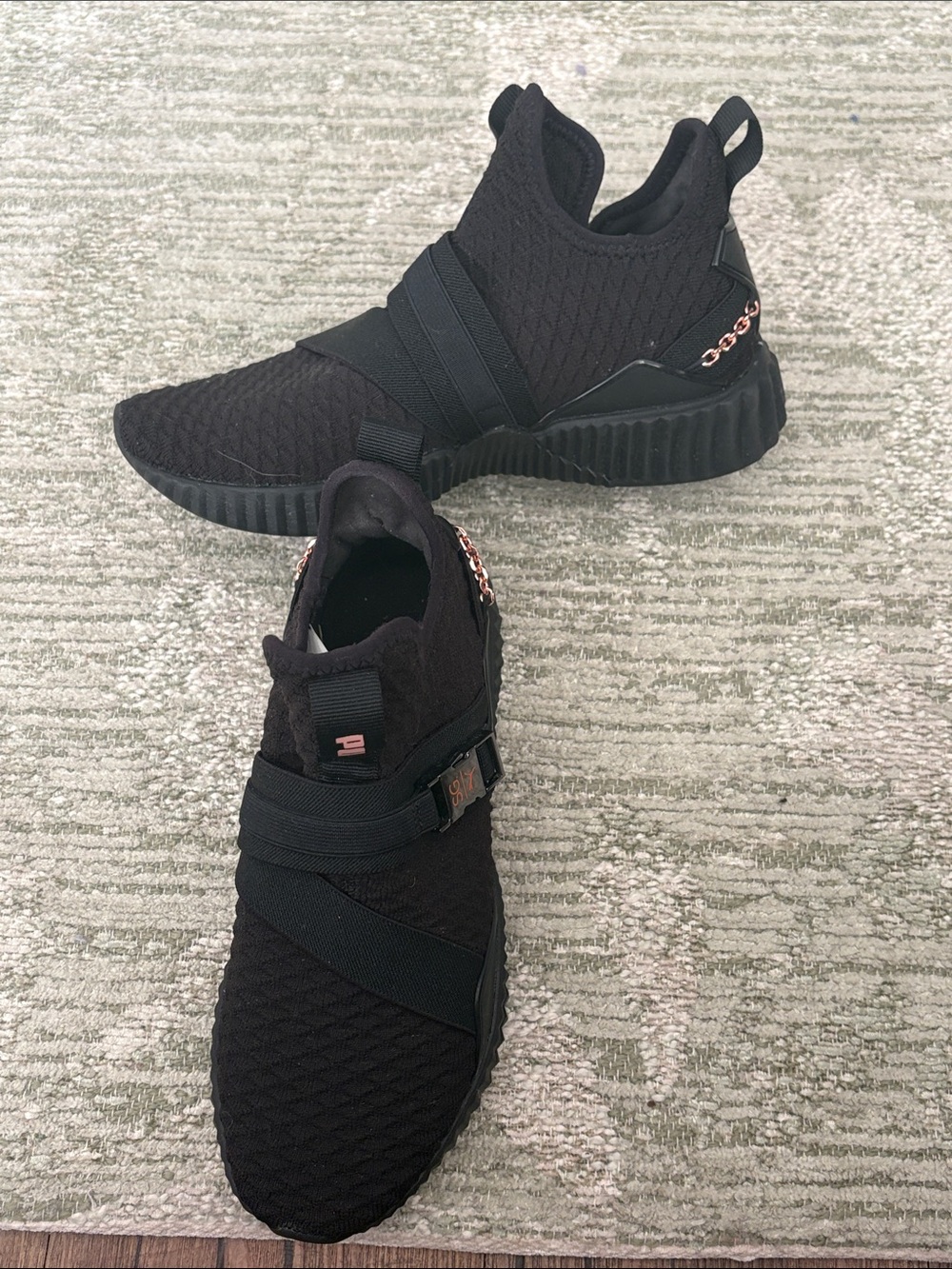 Black Puma Slip-On Knit Sneakers with Strap and Rose Gold Chain Detail